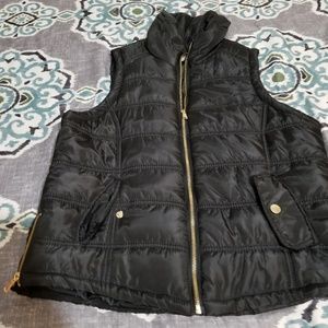 Black puffy vest